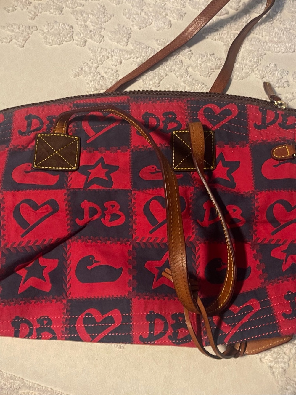 Dooney & Bourke Red and Black Patterned Tote with Brown Leather Straps